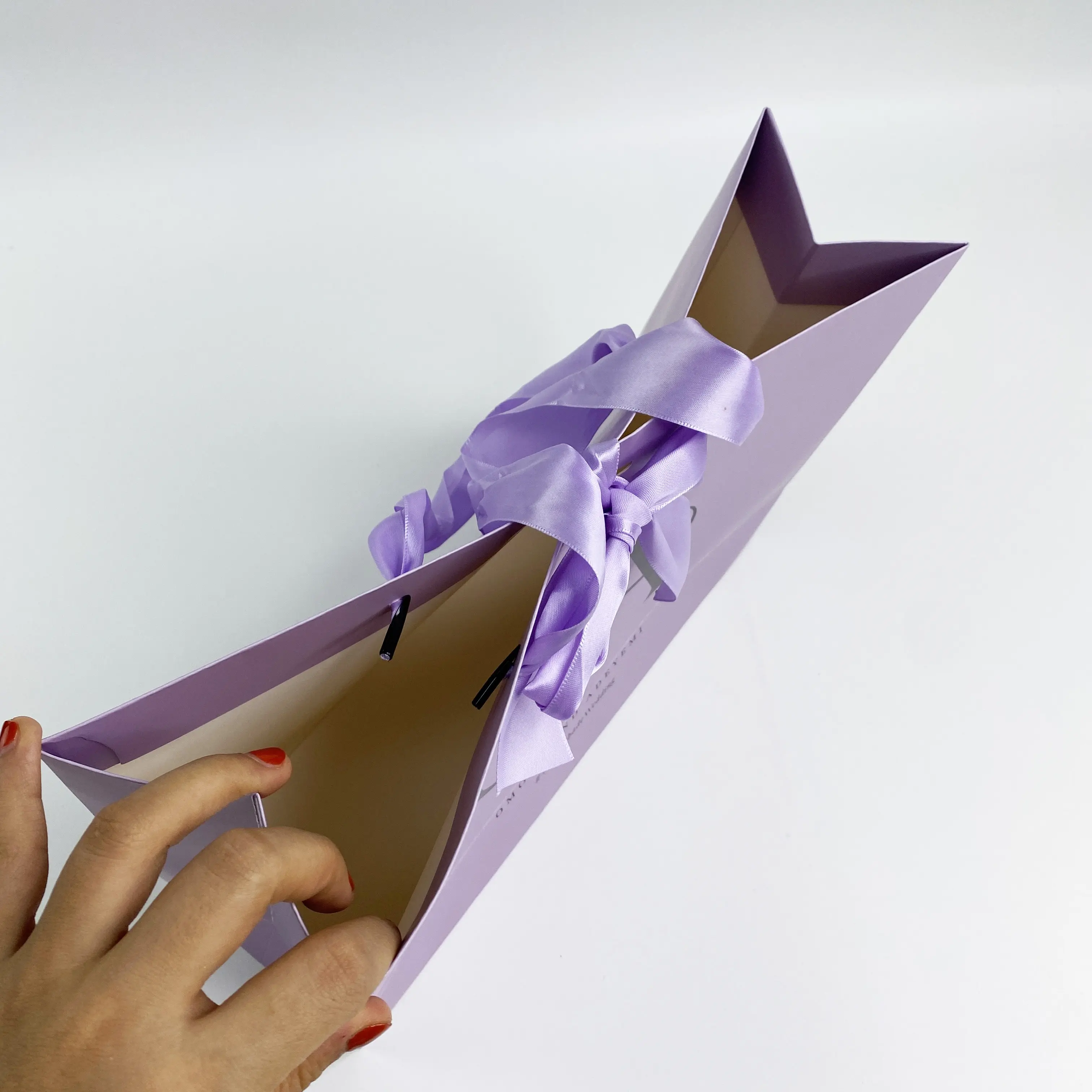 Purple paper shopping bag with custom logo printed