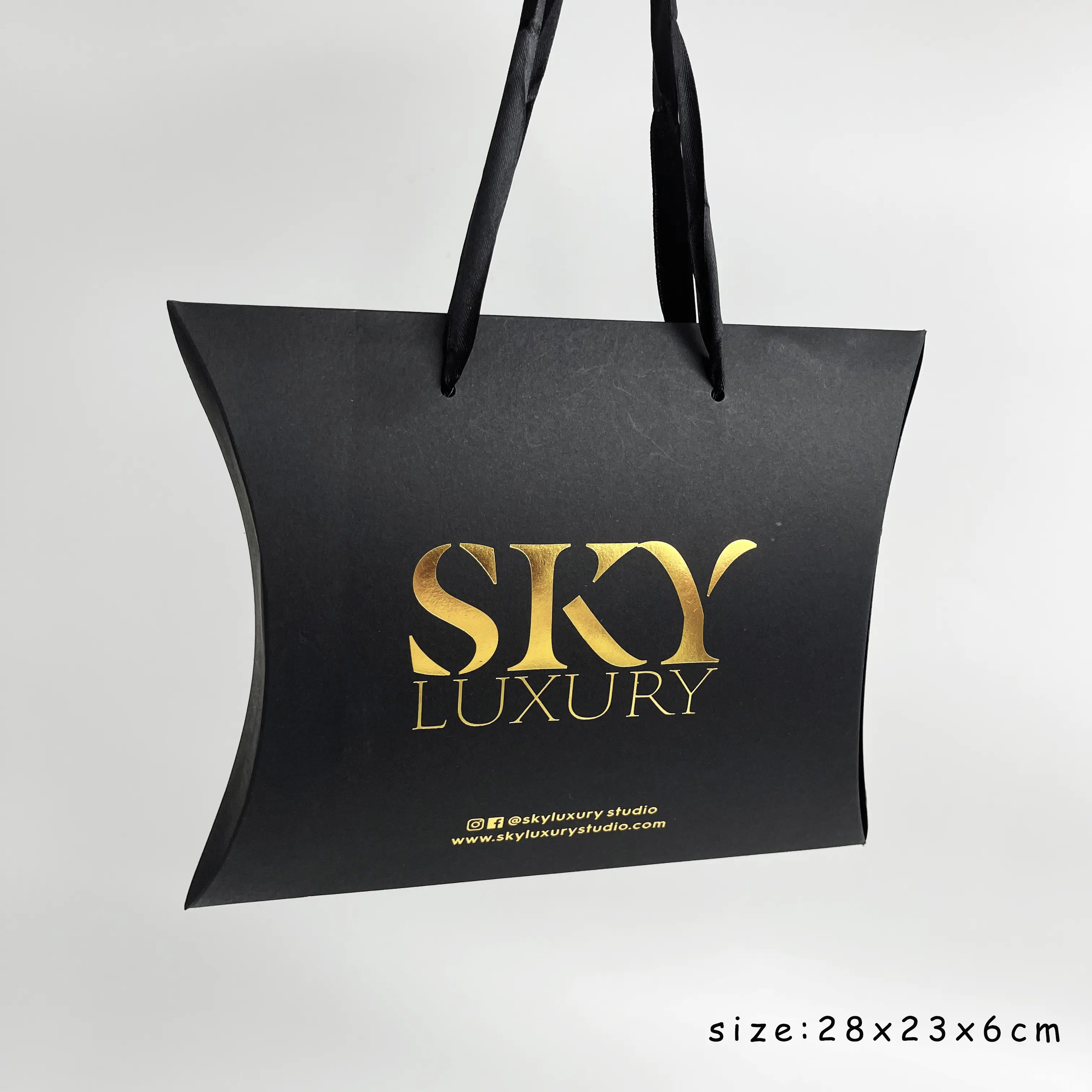 Black foil brand logo paper shopping bag